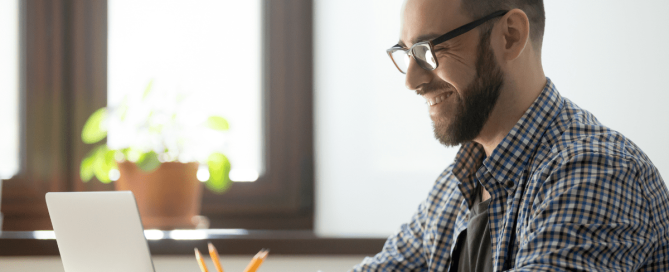 happy-male-Docker-Expert-working-home