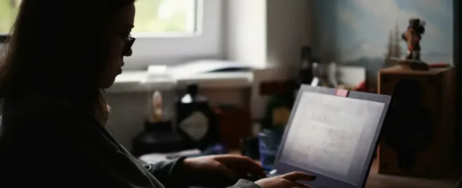 Database Tech Stacks: Woman in black jacket using MacBook pro