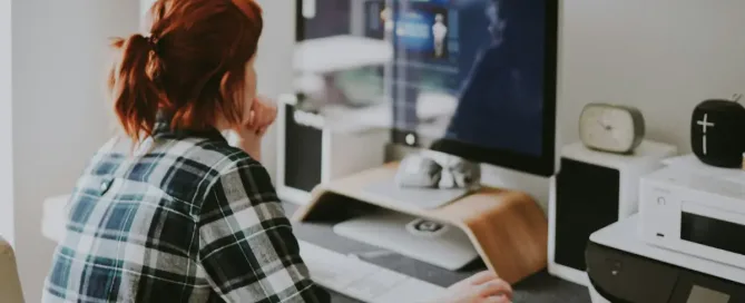 Nearshore Outsourcing for Web App Development: woman browsing on the internet