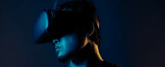 Man wearing a VR headset, symbolizing AR/VR development with frameworks for streamlined app creation.