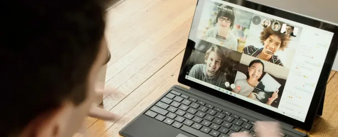 Person in a video call with a diverse team, symbolizing a focus on Diversity, Equity, Inclusion, and Belonging (DEIB) in the workplace.