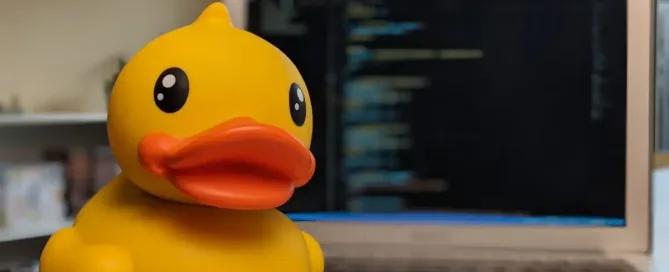 Debugging Hacks: Rubber Duck in front of computer