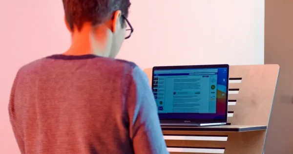 document security: female developer updates confluence
