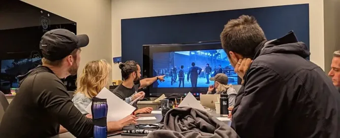 the last of us video game: Behind-the-scenes image of the team analyzing motion design